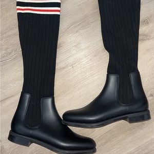 GIVENCHY
Knit Rubber Storm Over The Knee Boots